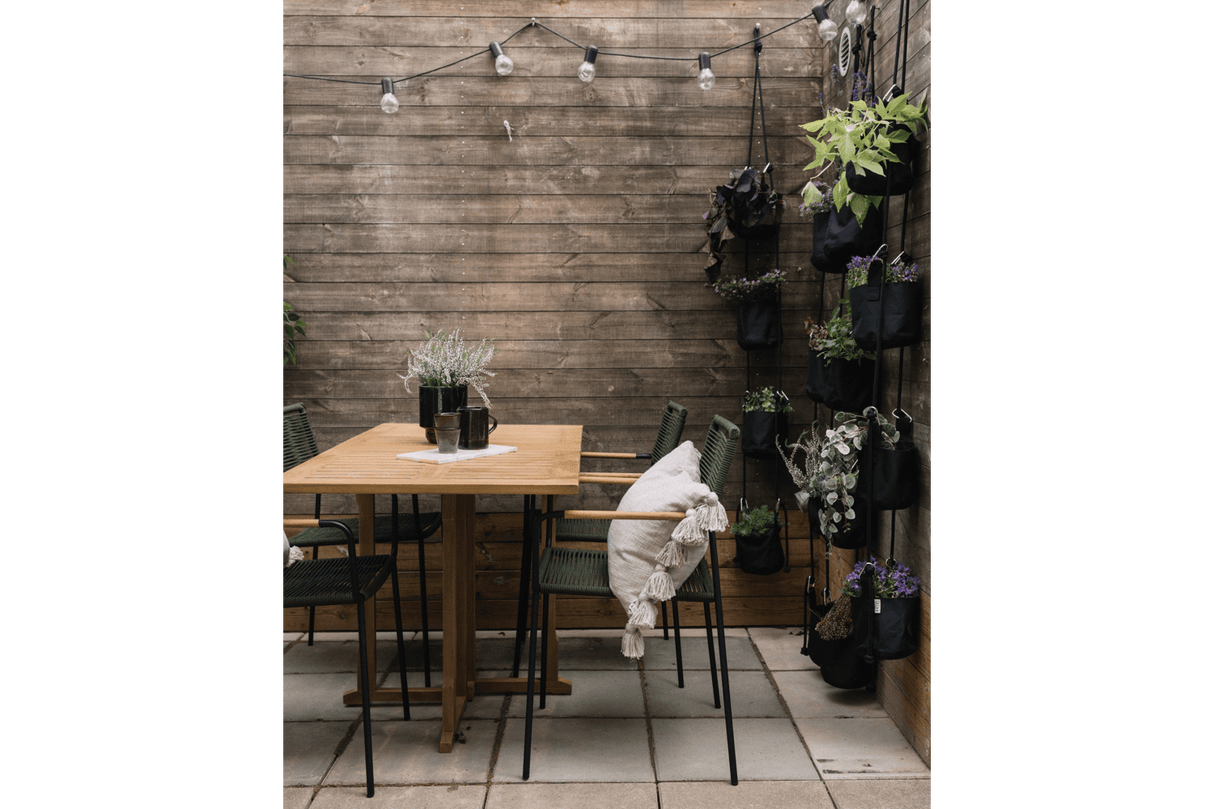 Freja wicker chair with armrest