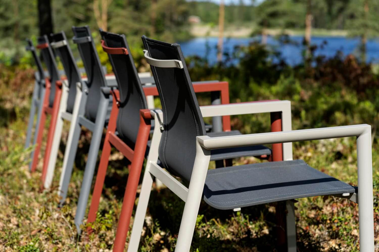 Delia stackable chair with armrest